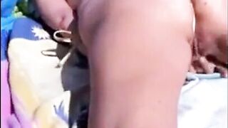 Me masturbating at a public beach