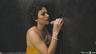 Babe suck my dick through the gloryhole